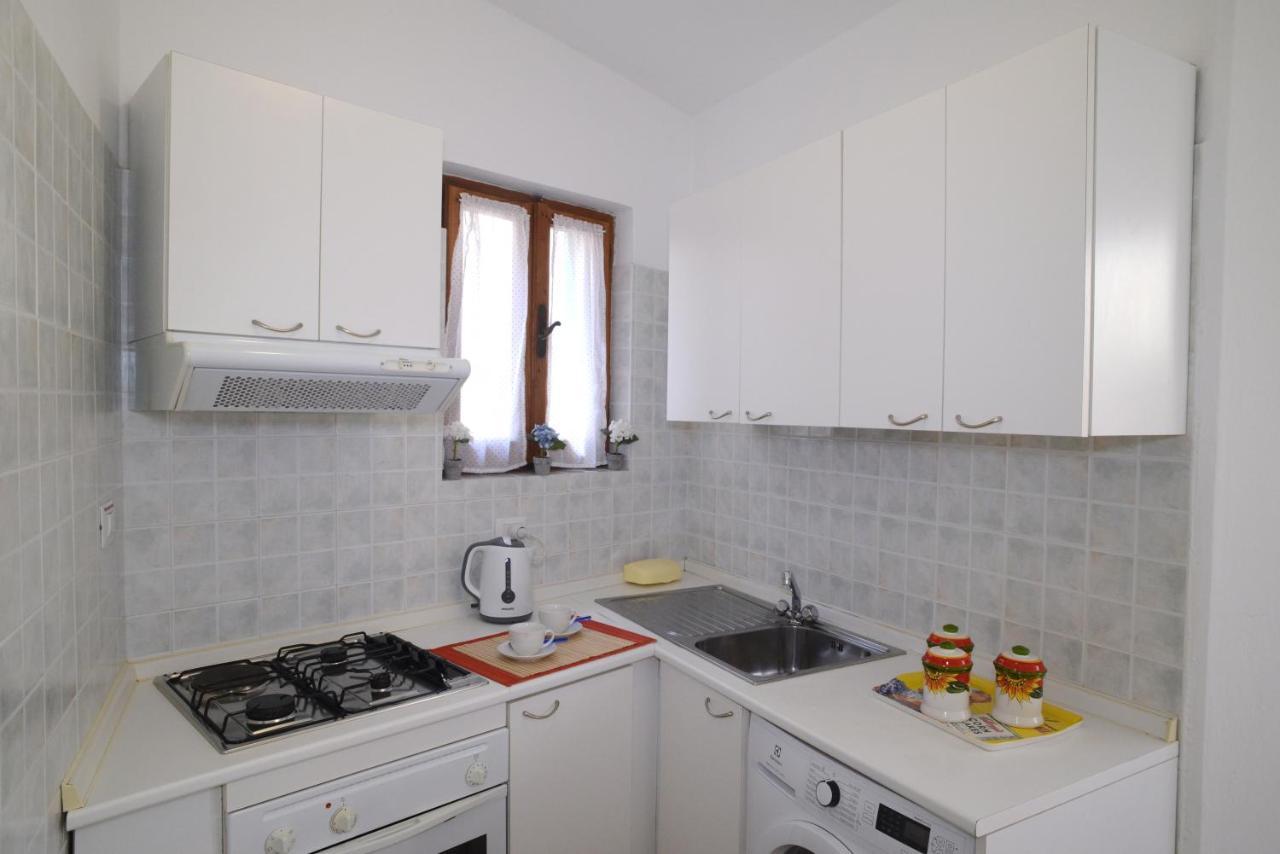 Old Town Secret Garden Apartment Alghero Bagian luar foto